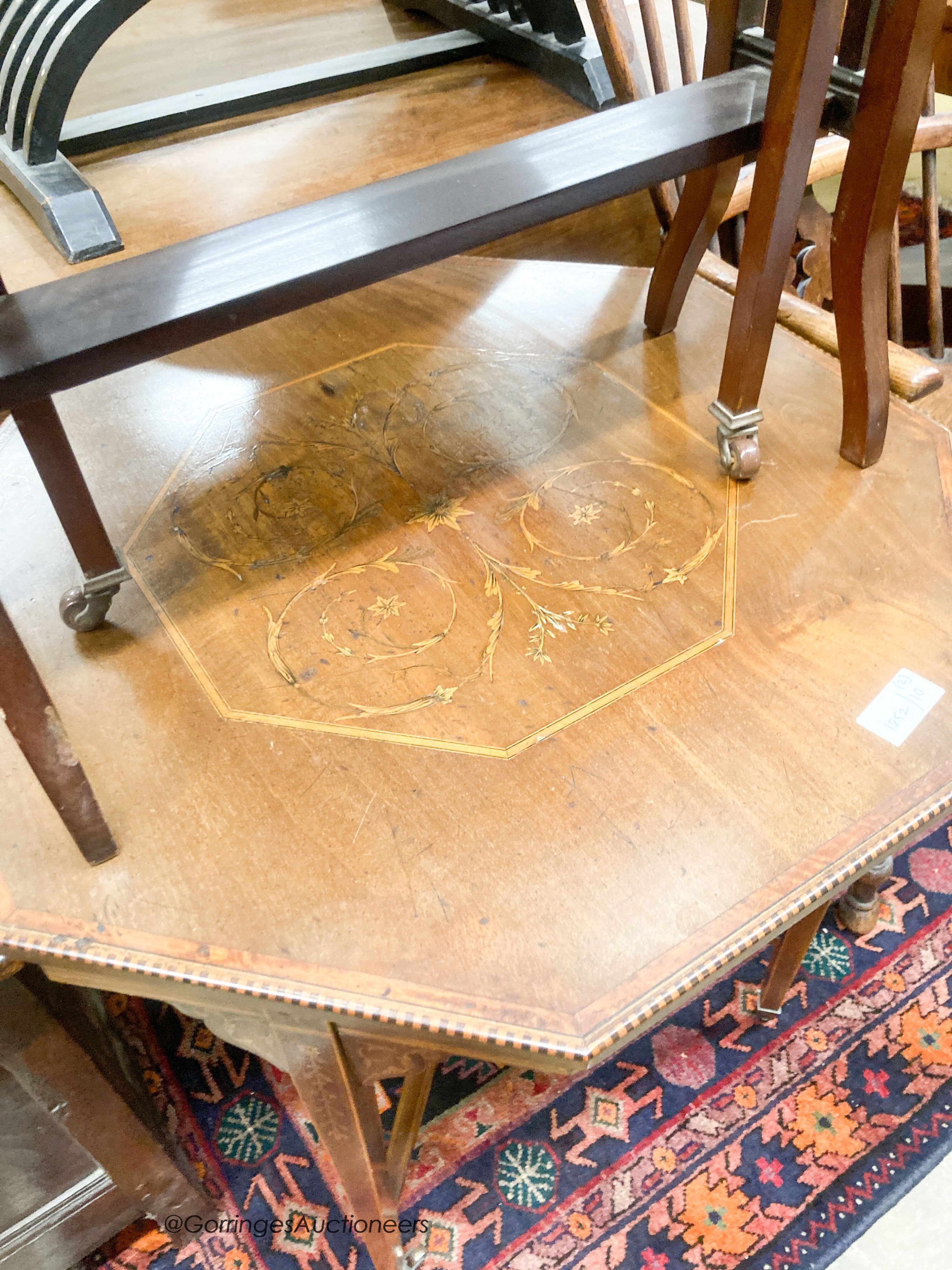 An Edwardian satinwood banded mahogany Pembroke table, height 66cm, together with an Edwardian marquetry inlaid octagonal centre table, width 69cm, height 68cm